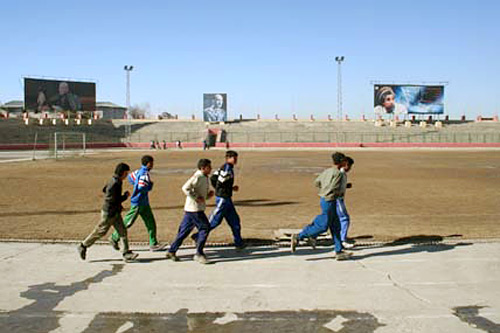 
                    Young Afghans exercise in Kabul's stadium, previously used by the Taliban for public executions.
                                            (Gregory West)
                                        