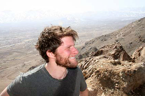 
                    Weekend America contributor Gregory Warner enjoys his own weekend climbing one of Afghanistan's many mountains. Behind him is the city of Kabul.
                                            (Courtesy Gregory West)
                                        