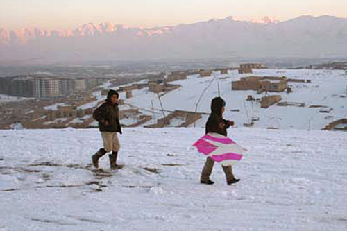 
                    Young kite flyers in Kabul. Kite flying is popular year-round in Afghanistan.
                                            (Gregory West)
                                        