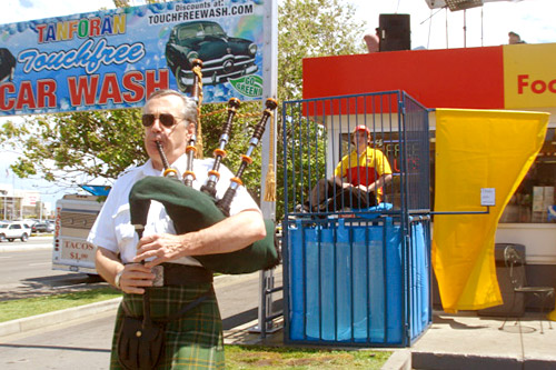 
                    Every weekend, the Tanforan Shell station in San Bruno, Calif., offers live music, a chance to dunk an employee and free car washes to customers who can offer the best 20-second rant about gas prices.
                                            (Courtesy  Bobak Bakhtiari)
                                        