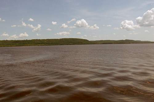 
                    The waters of Lake Pepin. The ripples we see here were caused by boats, not monsters.
                                            (John Moe)
                                        
