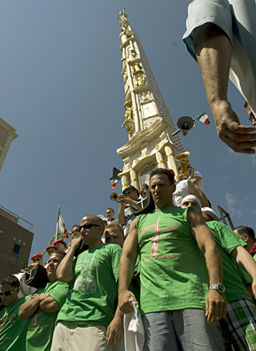 
                    The Giglio is lifted by 125 men who carry the structure on their shoulders. They are led by the Capo Peranza, and there are eight lieutenants directing each corner.
                                            (Michael Bocchieri)
                                        