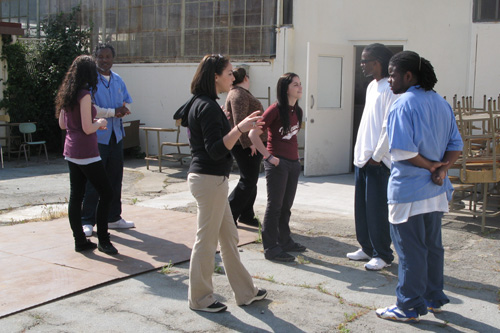 
                    Volunteers and inmates getting acquainted before food sale gets underway.
                                            (Nancy Mullane)
                                        