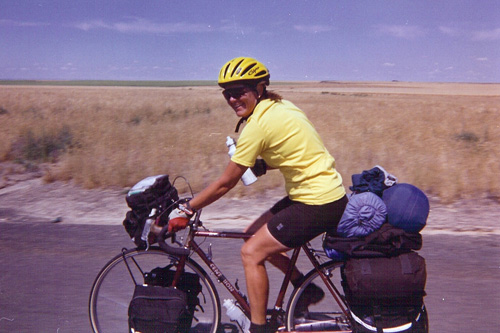 
                    Candyce Deddens rides through Washington State. In 1999 at the age of 50, she rode solo across the country for eight months.
                                            (Courtesy Candyce Deddens)
                                        