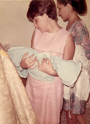 
                    Sulaiman holding her goddaughter at the latter's baptism a year before the Ba'ath Party's rise to power in 1968.
                                            (Courtesy Mona Sulaiman)
                                        