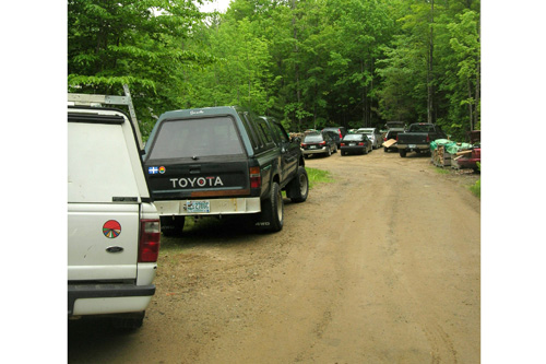 
                    The volunteers flock to energy raisers from neighboring communities, filling their hosts' driveways.
                                            (Shannon Mullen)
                                        