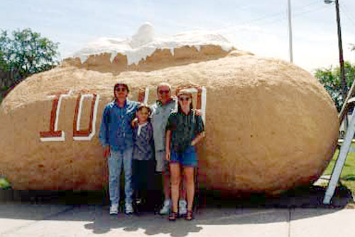 
                    The Keith Family. From left: Vikke, Donovan, Donn and Tamara in front of a giant Idaho potato.
                                            (Courtesy Keith Family)
                                        