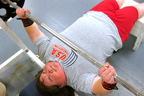 
                    Paralympic power lifter Mary Stack benches 240 during training at the University of Michigan.
                                            (Gideon D'Arcangelo)
                                        