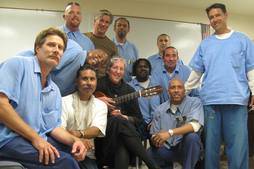 
                    Jaimee Karroll and Jacques Verduin with the inmates in the Insight Prison Project.
                                            (Nancy Mullane)
                                        