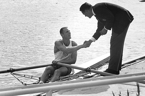 
                    Don Spero is greeted by Thomi Keller of Switzerland, then-president of FISA (International Rowing Federation) as Spero arrives to the awards float after winning the 1966 World Championships.
                                            (Courtesy Don Spero)
                                        
