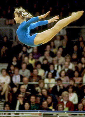 
                    Belarus-born Olga Korbut of the (then) Soviet Union competing at the 1972 Olympic Games in Munich, Germany. Korbut won gold on the balance beam and floor exercises. She won a silver medal on the uneven parallel bars and was a member of the winning all-round team as well.
                                            (Allsport UK/Allsport)
                                        