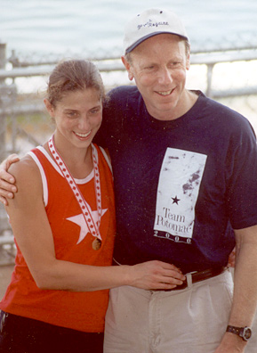 
                    Don Spero on the awards float with daughter and Weekend America contributor Laura Spero at the Canadian Henley in 2001, where Laura won a gold medal in the lightweight quad for Potomac Boat Club.
                                            (Courtesy Don Spero)
                                        