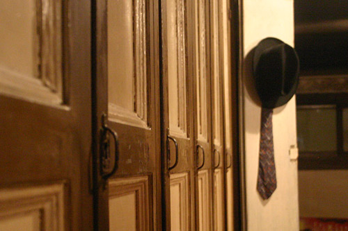 
                    Lockers line a hallway in the Panama's basement. A hat and tie still hangs in one.
                                            (Dominic Amorosia)
                                        