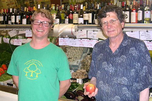
                    Adrian McEvilly (left), manages Star Grocery in Berkeley, Calif. Standing next to him is Nick Pappas, its owner. Star Market has been in the Pappas Family for more than 80 years, and has a tradition of buying produce from people's backyards.
                                            (Krissy Clark)
                                        