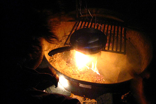 
                    Campfire cooking.
                                            (Khanh Tran)
                                        