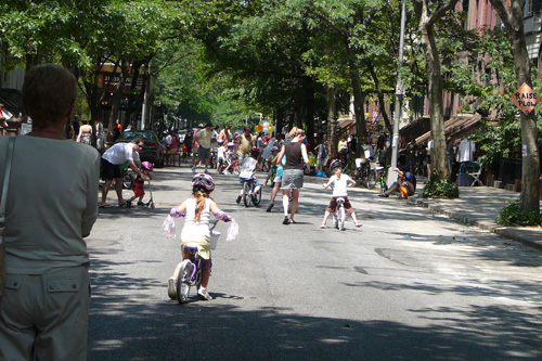 
                    The scene on West 87th Street, where Bike New York held a clinic to teach children to ride a bike.
                                            (Kate Hinds)
                                        