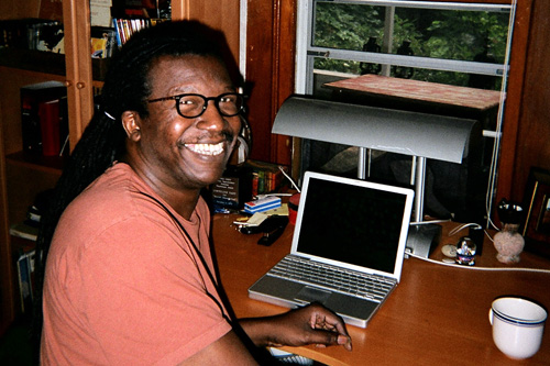 
                    Cornelius Eady takes a break from writing. The two cottages he and his wife Sarah Micklem bought afford them the opportunity to have their own offices, something they don't have in their Manhattan apartment.
                                            (Sarah Micklem)
                                        