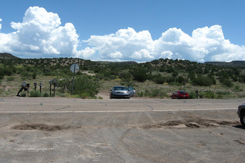 
                    This is the entrance to McCain's cabin right off Arizona's Highway 89-A. The mailboxes are the only sign anyone leaves nearby. McCain's cabin is called the "Hidden Valley Ranch."
                                            (Rene Gutel)
                                        