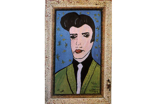 
                    "Pablo Presley" by Bonnie Daly is accompanied by a placard which bears the following interpretation: "A refreshing multicultural treatment of one of the 20th century's most beloved and painted icons."
                                            (Courtesy Museum of Bad Art)
                                        