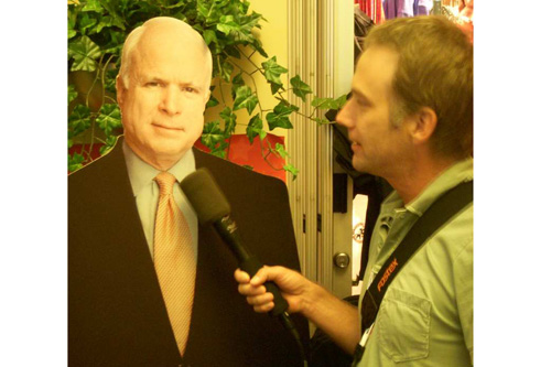 
                    Jim Gates tries to get an interview with a cardboard John McCain.
                                            (Jim Gates)
                                        
