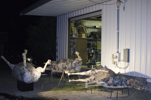 
                    The papier-mached horses wait at night for Caballos de Vigilancia.
                                            (Courtesy of the artists)
                                        