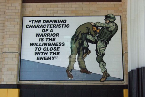 
                    The motto at the U.S. Army Combatives school.
                                            (Philip L. Graitcer)
                                        