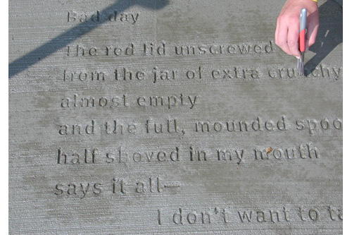 
                    The final impression of Caley Conney's poem "Bad day" is printed into the sidewalk.
                                            (Chris Roberts)
                                        