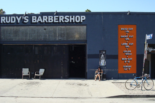 
                    Rudy's Barbershop in Los Angeles' Silver Lake neighborhood used to be an auto-repair shop.
                                            (Charlie Schroeder)
                                        