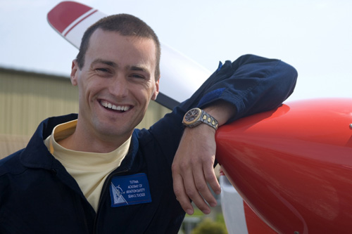 
                    Eric Tucker poses next to his plane.  In the air, he says, "the freedom is just unparalleled."
                                            (www.jessicaambats.com)
                                        