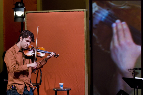 
                    Cornelius Dufallo, who plays violin in ETHEL's Truckstop.
                                            (Jack Vartoogian/Front Row Photos)
                                        