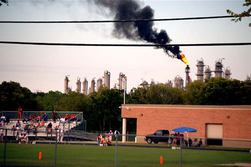 
                    The Texas Petrochemicals flare above Cesar Chavez High School in Houston.
                                            (Bryan Parras)
                                        