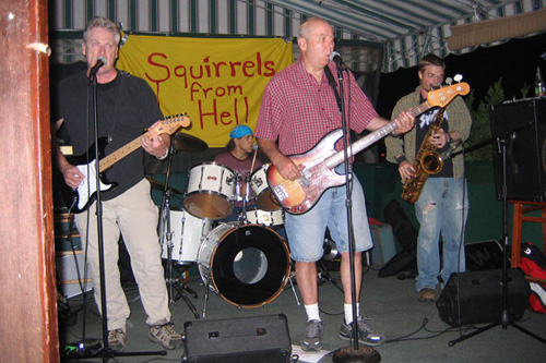 
                    Squirrels from Hell at a recent gig in the Hamptons.  They've been playing for the runners at the marathon for 20 years.
                                            (Courtesy Squirrels from Hell)
                                        