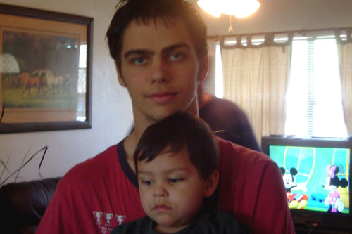 
                    Justin Logan on his first weekend home, with his son, Michael.
                                            (Tori Marlan)
                                        