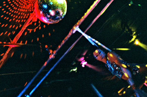 
                    Jessie Sorrentos spins above the dance floor of Styxx Nightclub as The Human Disco Ball.
                                            (Kirk Torregrossa)
                                        