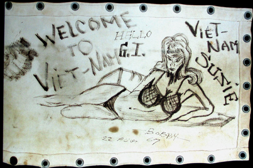 
                    One soldier left this menacing drawing for the entertainment of other troops, a bikini-clad woman with a Ho Chi Minh-style goatee.
                                            (Courtesy Lee Beltrone)
                                        