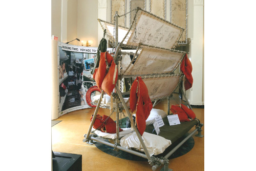 
                    A rebuilt 8-man bunk rack, originally found on the General Nelson M. Walker, serves as the centerpiece of the "Marking Time: Voyage to Vietnam" exhibit that is currently touring the country.
                                            (Courtesy Photoworks)
                                        