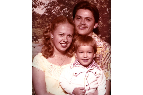 
                    Jonathan with his parents about a year before they divorced. Jonathan was three when his mom Rosanna started working at a company that was then called Sinclair Paints.
                                            (Courtesy Jonathan Menjivar)
                                        