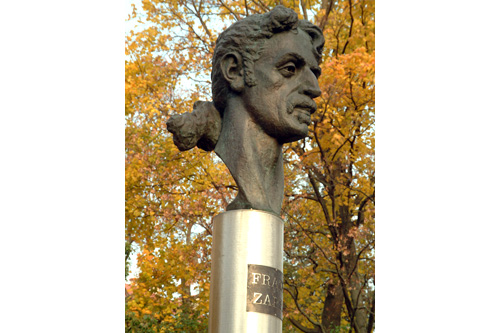 
                    The original Lithuanian bust of Frank Zappa stands on an 11-foot stainless steel pole. It was dedicated in this Vilnius park in 1995.
                                            (Saulius Paukstys)
                                        