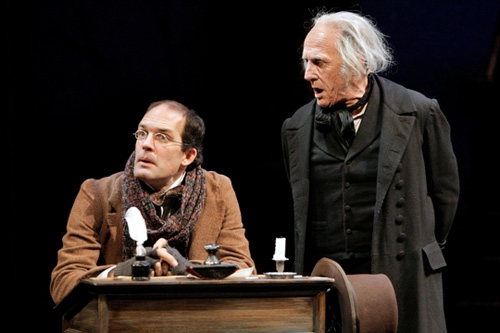 
                    Michael Booth (Bob Cratchit) and Raye Birk (Ebenezer Scrooge) in the Guthrie Theater production of A Christmas Carol, by Charles Dickens.
                                            (Michal Daniel)
                                        