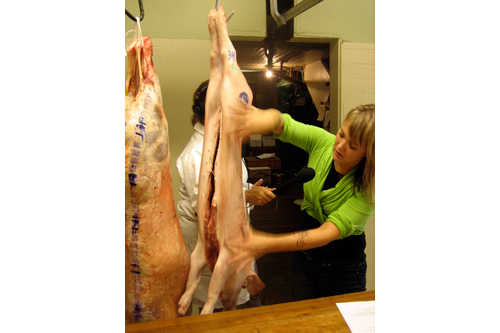 
                    Tia Harrison, one of three female owners of Avedano's, is the head butcher and instructs the butchery class.
                                            (John Jakubowski)
                                        