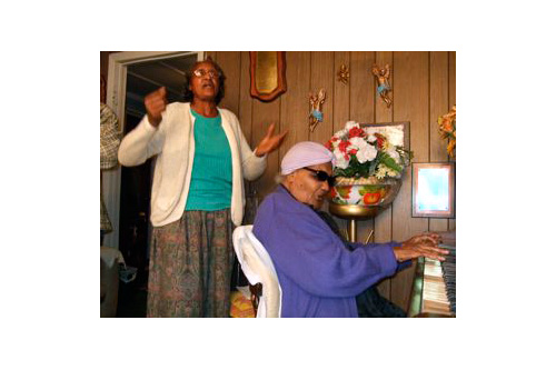 
                    Willie Mae Eberhardt and Fleta "Mother" Mitchell at the piano.
                                            (Philip L. Graitcer)
                                        