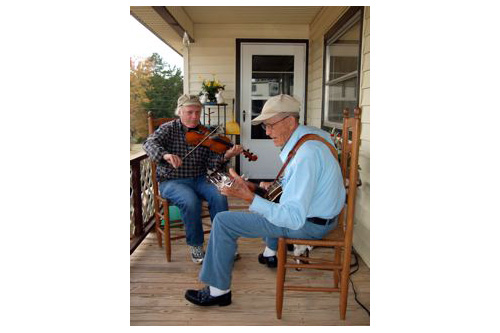 
                    Art Rosenbaum playing fiddle with banjo picker Ed Teague.
                                            (Philip L. Graitcer)
                                        