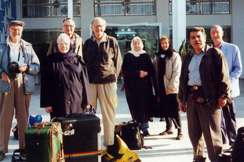 
                    This is a photo of Kathryn Kern leading a 34-day "Behind the Veil" group tour to Iran in April 2001. From right to left: Bill Frye, Linda Distad, Duane Sundell, Richard E. Frye (Professor Emeritus of Iranian Studies at Harvard), Jan Townsley, Kathryn Kern, Guide Haj Hadi and Ed Townsley.
                                            (Courtesy Kathryn Kern)
                                        