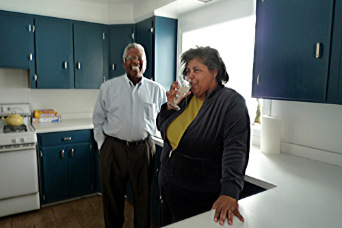 
                    Connie and Romey enjoy lemonade in their kitchen. They plan to be in this smaller home throughout their retirement years.
                                            (Desiree Cooper)
                                        