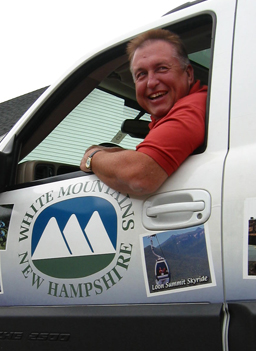 
                    Mike "White Mountain Mikey" Duprey in the White Mt. Attractions truck.
                                            (Shannon Mullen)
                                        