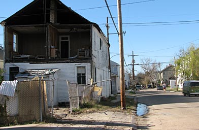 
                    Palmyra Street in Mid-City New Orleans as desolate and devastated as it was months ago.
                                            (Keith O'Brien)
                                        