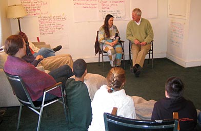 
                    George Lakey, executive director of Training for Change, works with workshop participant Jana Schroeder.
                                            (Andrew Willis)
                                        