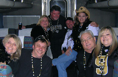 
                    Football fans on the train from New Orleans to Chicago.
                                            (Jenni Lawson)
                                        