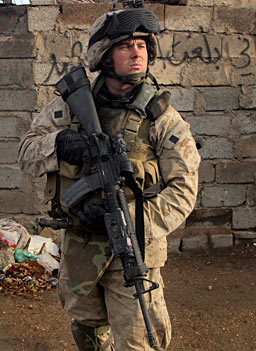 
                    Photo of Byron Norwood on the first day in Fallujah, 9 Nov 2004. Unposed.
                                            (Lucian Read of World Picture News)
                                        