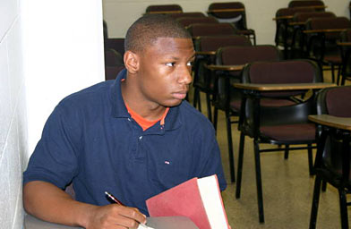 
                    Ignacio Evans listening to an opponent.
                                            (Baltimore Urban Debate League)
                                        